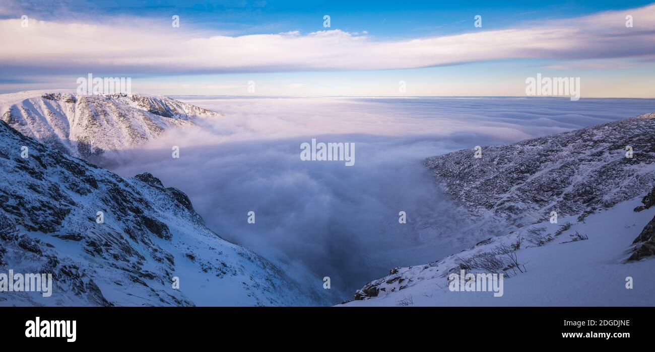 Mountains poking out of a cloud inversion at sunset on Mt. Katahdin ...