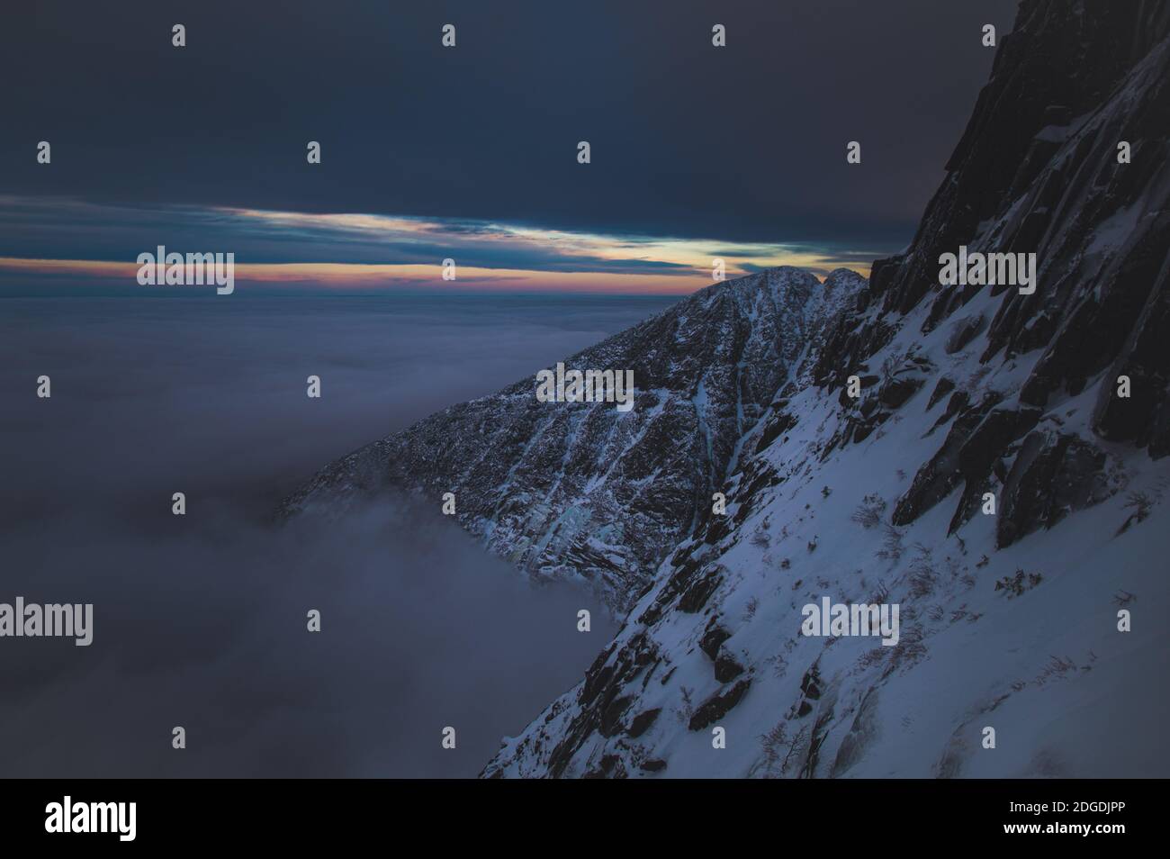 The last light of a cloud inversion sunset on Mt Katahdin Stock Photo ...