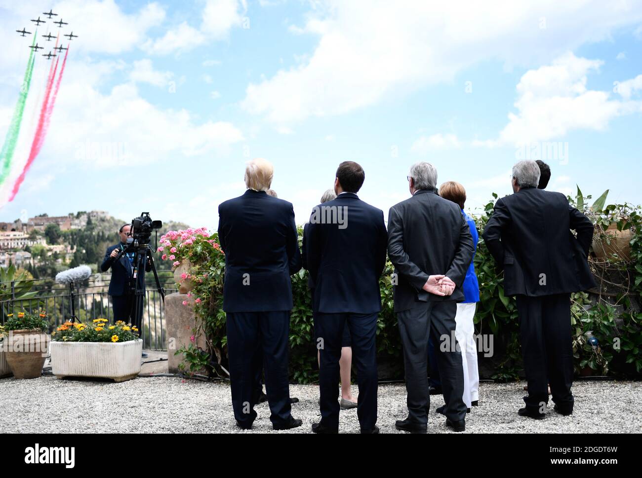 Participants of the G7 summit watch an Italian flying squadron as they attend the Summit of the Heads of State and of Government of the G7, the group of most industrialized economies, plus the European Union, on May 26, 2017 in Taormina, Sicily.The leaders of Britain, Canada, France, Germany, Japan, the US and Italy will be joined by representatives of the European Union and the International Monetary Fund (IMF) as well as teams from Ethiopia, Kenya, Niger, Nigeria and Tunisia during the summit from May 26 to 27, 2017. Photo by Stephane De Sakutin/ Pool /ABACAPRESS.COM Stock Photo