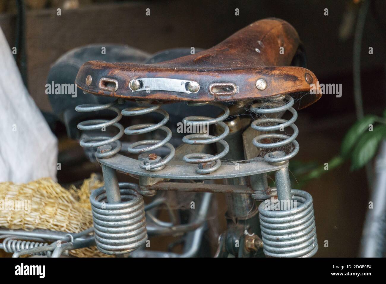 Retro leather bike seat spring hi-res stock photography and images - Alamy
