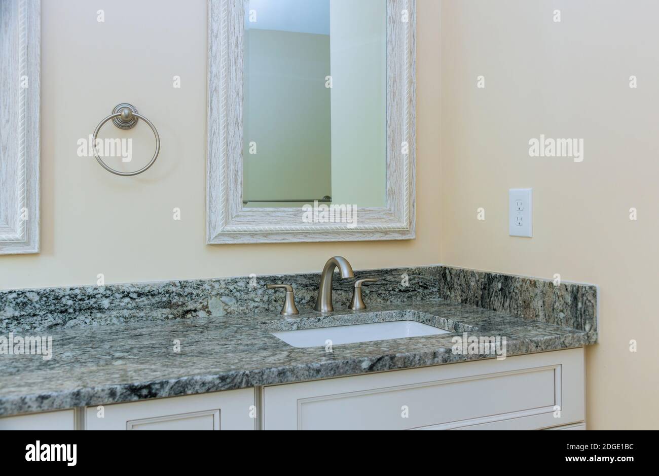 Elegant designer sink in bathroom in counter tap luxury home Stock Photo
