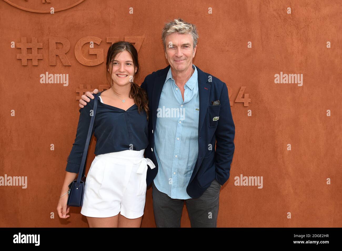 Philippe Caroit and his daughter Blanche posing at the Village during  French Tennis Open at Roland-Garros arena in Paris, France on May 30, 2017.  Photo by Laurent Zabulon/ABACAPRESS Stock Photo - Alamy