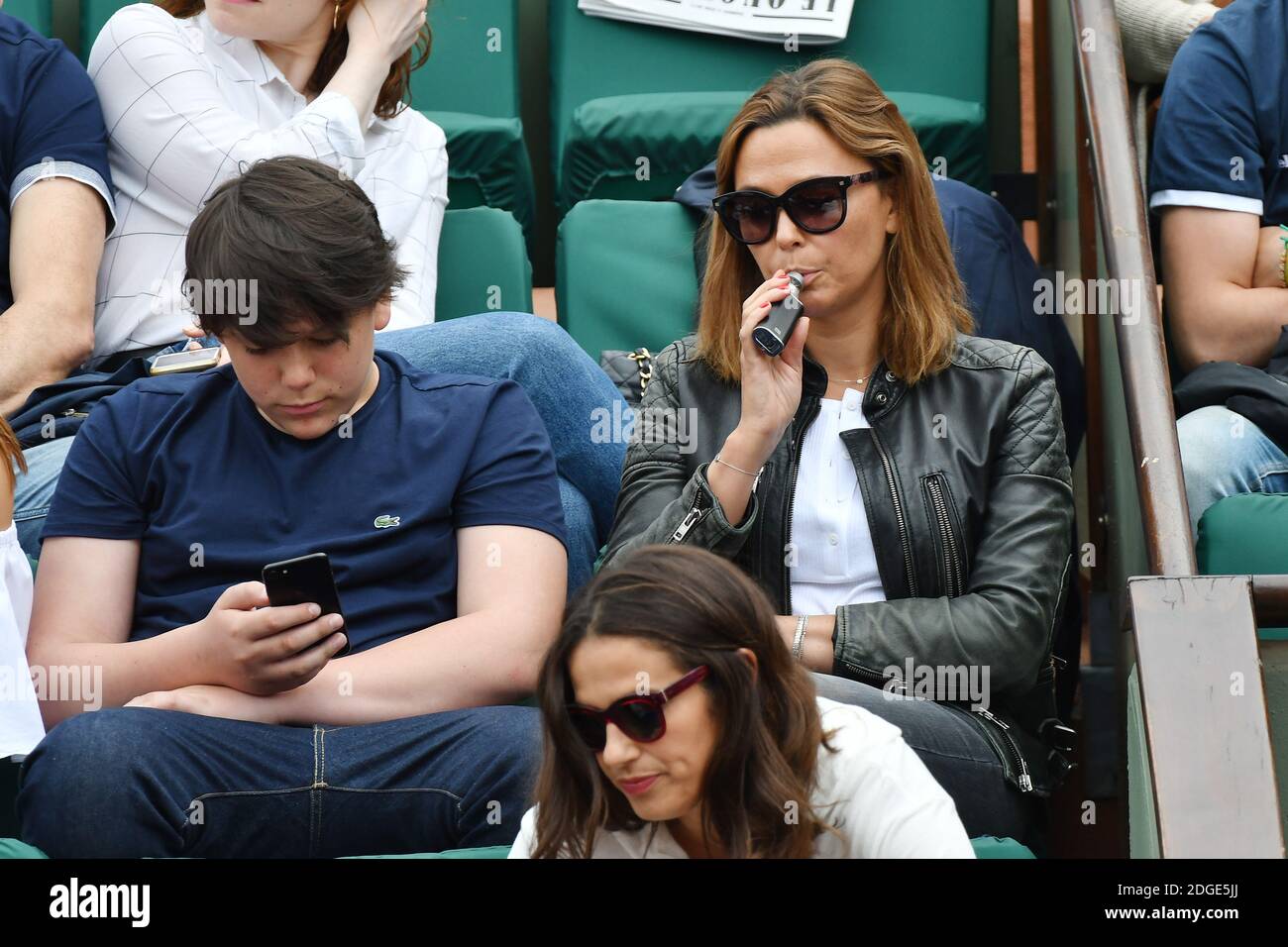 Sandrine Quetier and her son attend the French Tennis Open at Roland