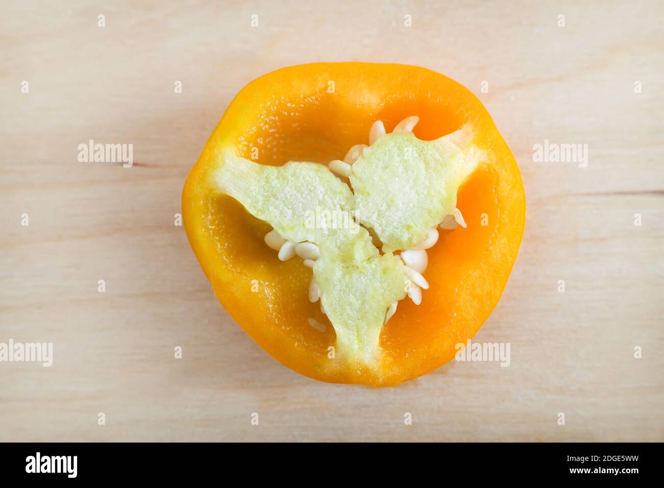 Cross section of yellow bell pepper, top view. Stock Photo