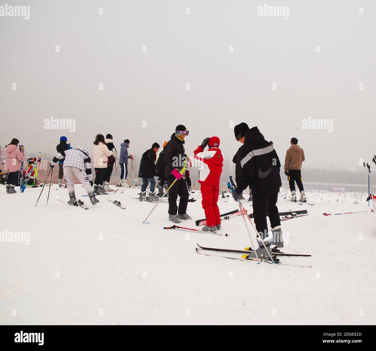 people are exciting and learning skiing at a holiday Stock Photo