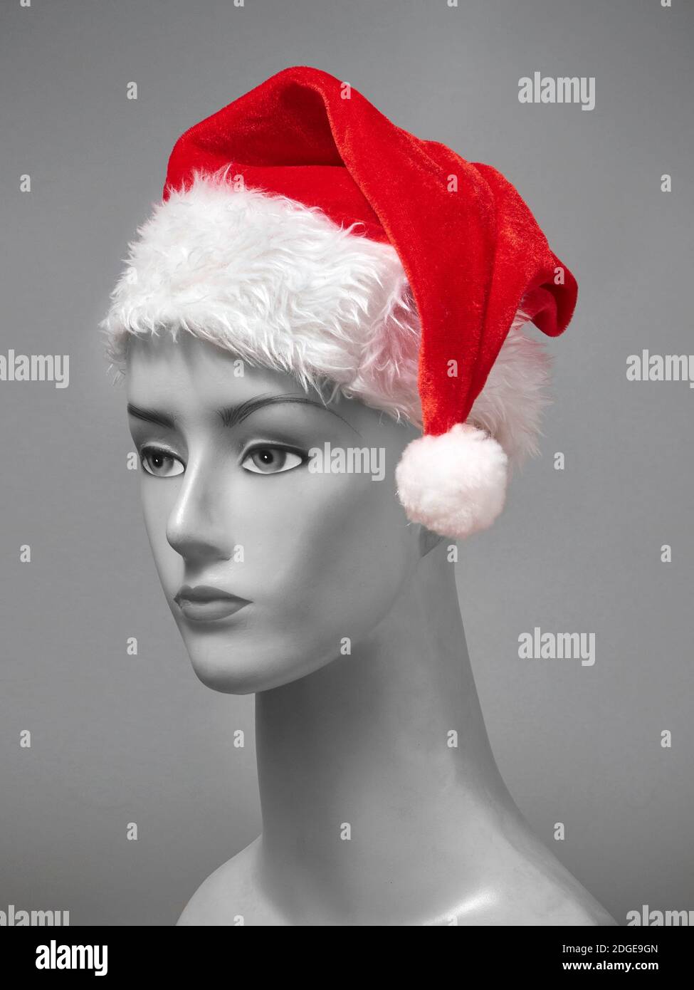 stock image of Santa Claus hat with grey mannequin Stock Photo
