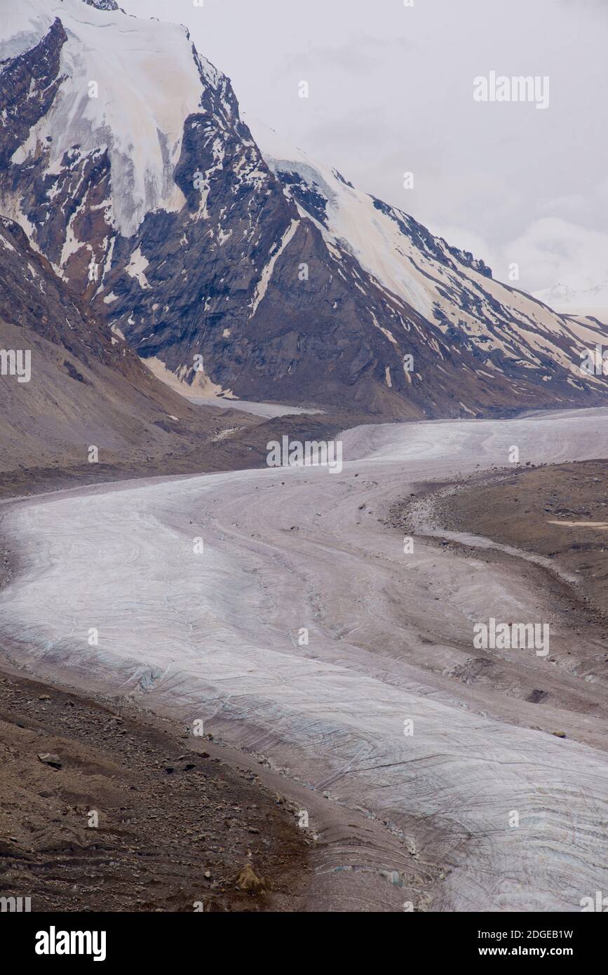 The Drang-Drung Glacier (also called Durung Drung Glacier) is a mountain glacier near the Pensi La mountain pass on the Kargil - Zanaskar Road in the Kargil district of Ladakh, Jammu & Kashmir, northern India. Stock Photo