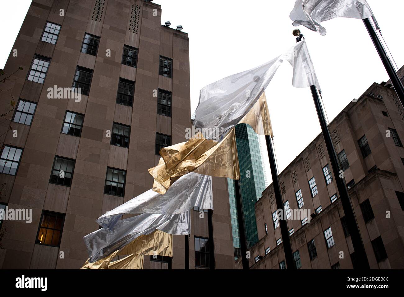 Holiday Flags Are Flowing During The Holidays in Rockefeller Center New York City Stock Photo