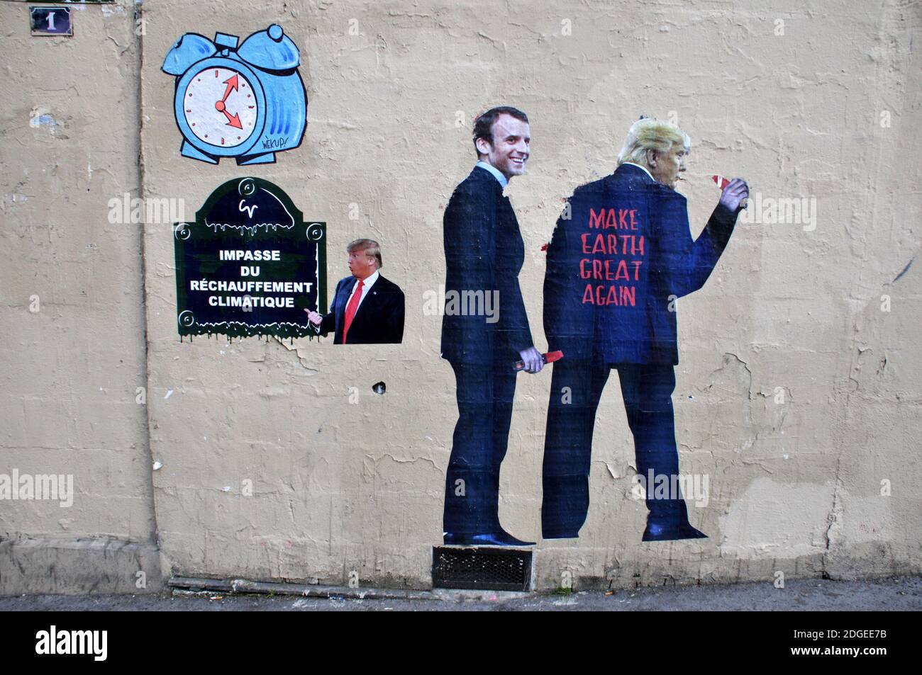 A Street Art work shows US President Donald Trump and President Emmanuel Macron on Paris Climate Agreement in Paris, France on June 13, 2017. Photo by Alain Apaydin/ABACAPRESS.COM Stock Photo