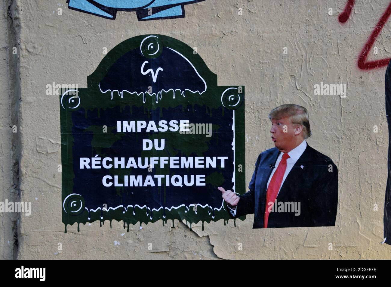 A Street Art work shows US President Donald Trump and President Emmanuel Macron on Paris Climate Agreement in Paris, France on June 13, 2017. Photo by Alain Apaydin/ABACAPRESS.COM Stock Photo