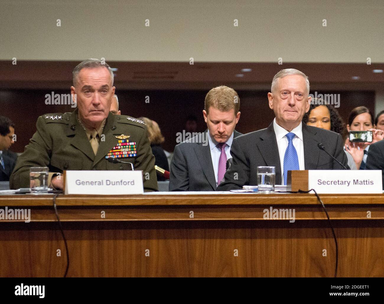 United States Secretary of Defense James N. Mattis, right, and General Joseph F. Dunford, Jr., US Marine Corps, Chairman of the Joint Chiefs of Staff, left, give testimony before the US Senate Committee on Armed Services on 'the Department of Defense budget posture in review of the Defense Authorization Request for Fiscal Year 2018 and the Future Years Defense Program' on Capitol Hill in Washington, DC on Tuesday, June 13, 2017.Photo by Ron Sachs / CNP/ABACAPRESS.COM Stock Photo