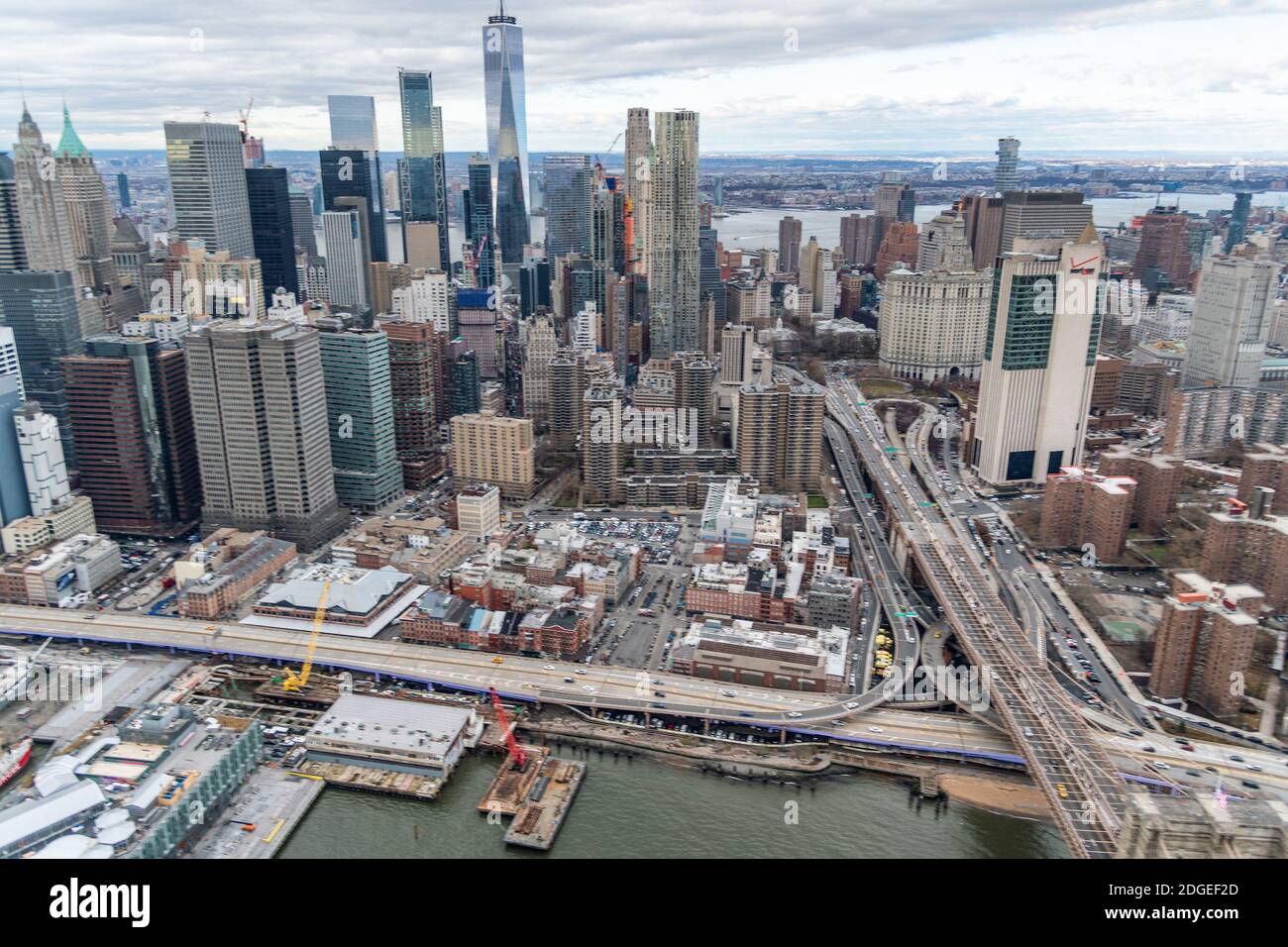 Blurred aerial view of Manhattan buildings and river from helicopter Stock Photo
