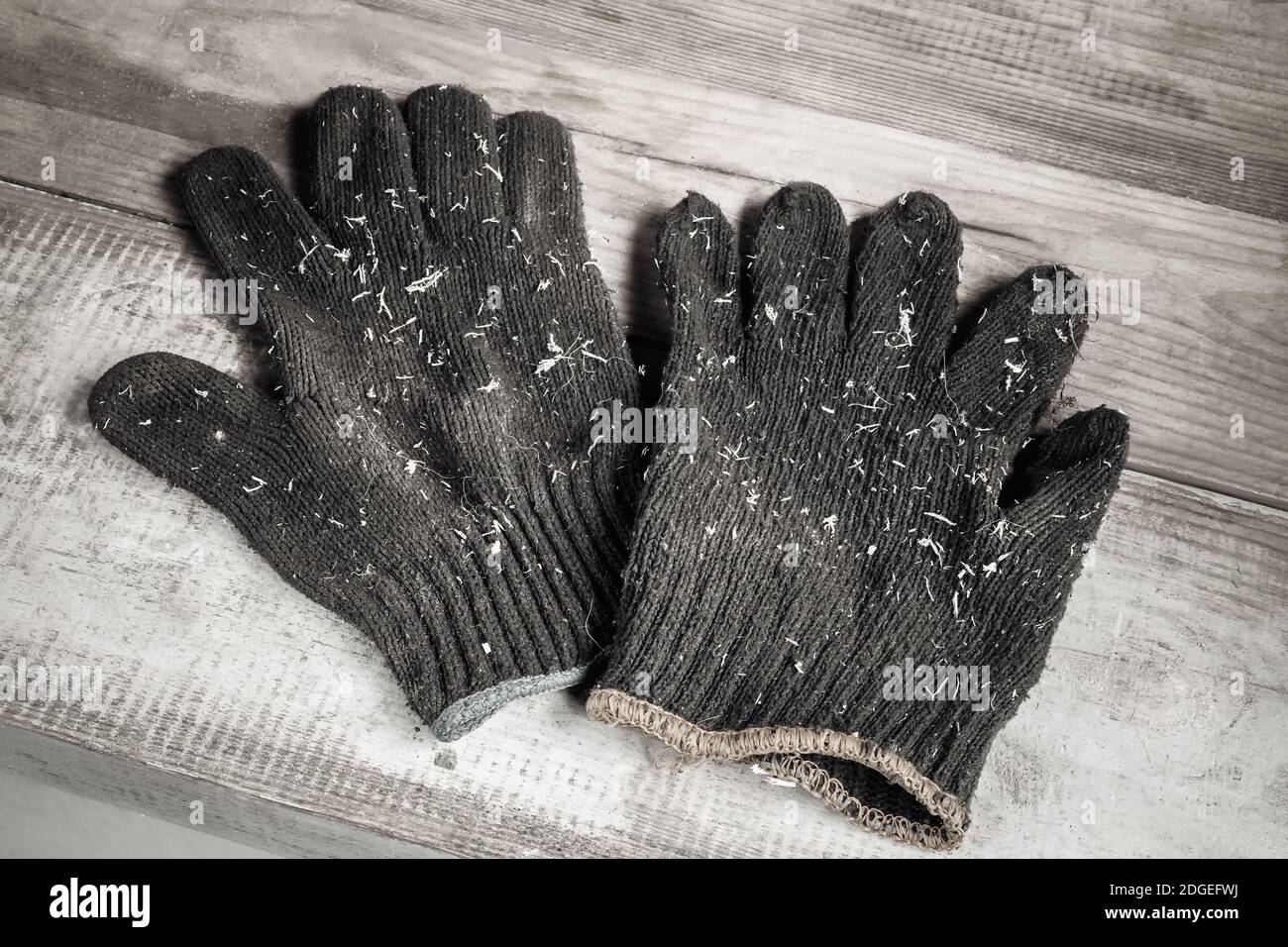 Cotton gloves to protect hands while working Stock Photo Alamy