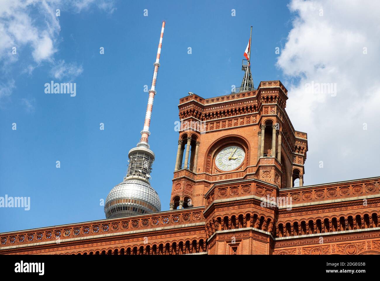 Red Rathaus in Berlin with Alexanderplatz tower on background Stock Photo