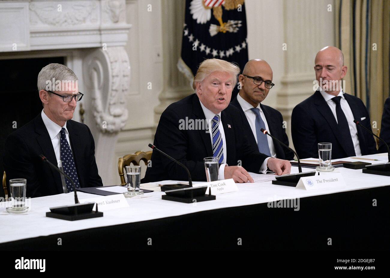 L-R) CEO of Apple Tim Cook , U.S. President Donald Trump, Microsoft CEO  Stya Nadella and Amazon CEO Jeff Bezos attend a meeting of the American  Technology Council in the State Dining
