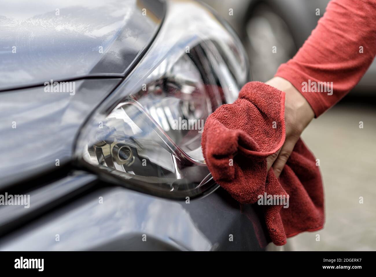 Polishing a car after the car wash Stock Photo Alamy