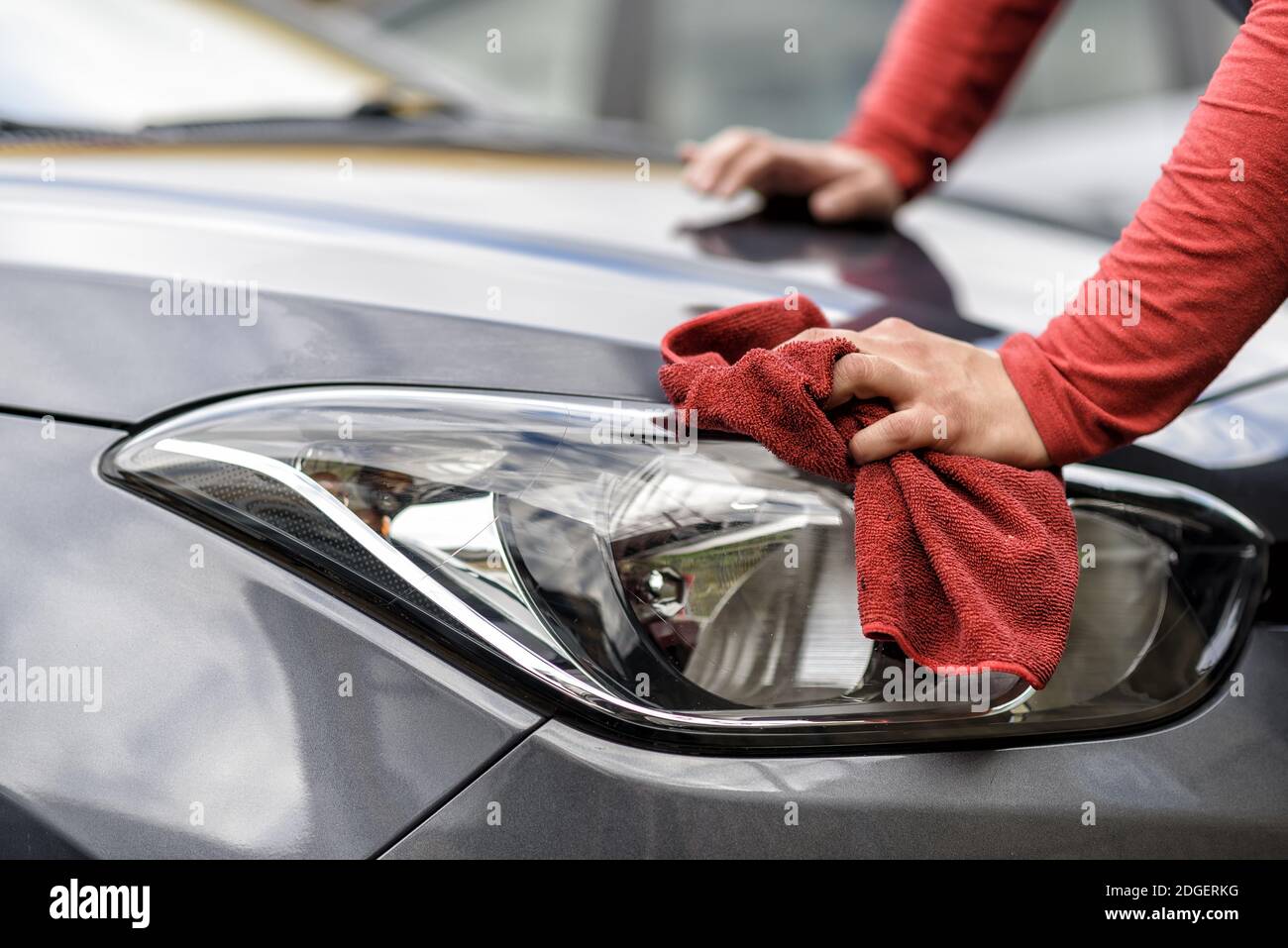 Polishing a car after the car wash Stock Photo Alamy