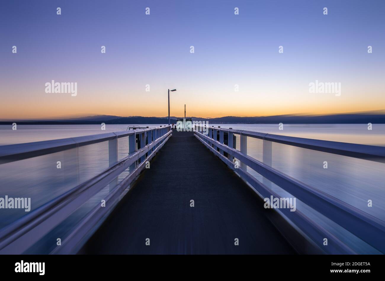 Sunshine Bay with motion blur which is located Wellington Harbour,New  Zealand Stock Photo - Alamy