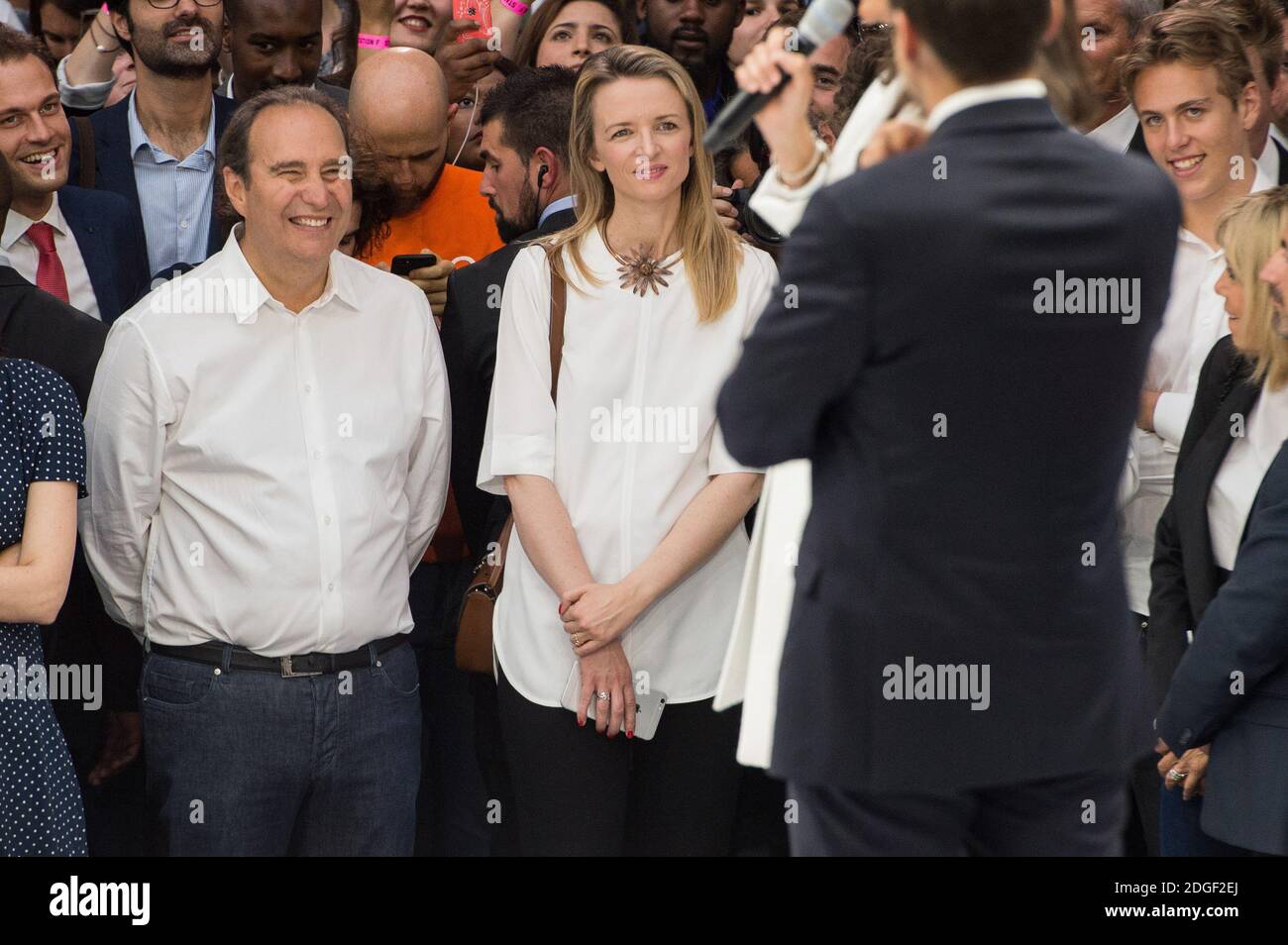 Xavier Niel and Delphine Arnault in stands during French Tennis