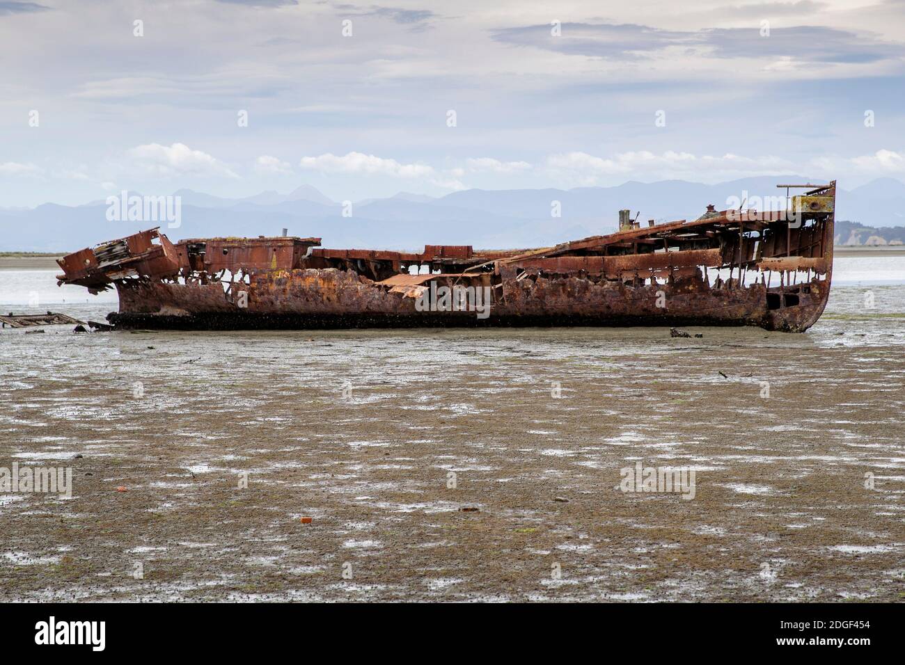 The rusted remains of the Janie Seddon shipwreck on the Motueka foreshore, Nelson Tasman, New Zealand on Saturday, November 21, 2020. Stock Photo