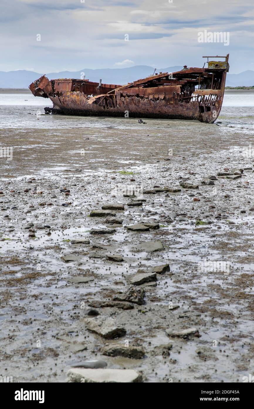 The rusted remains of the Janie Seddon shipwreck on the Motueka foreshore, Nelson Tasman, New Zealand on Saturday, November 21, 2020. Stock Photo
