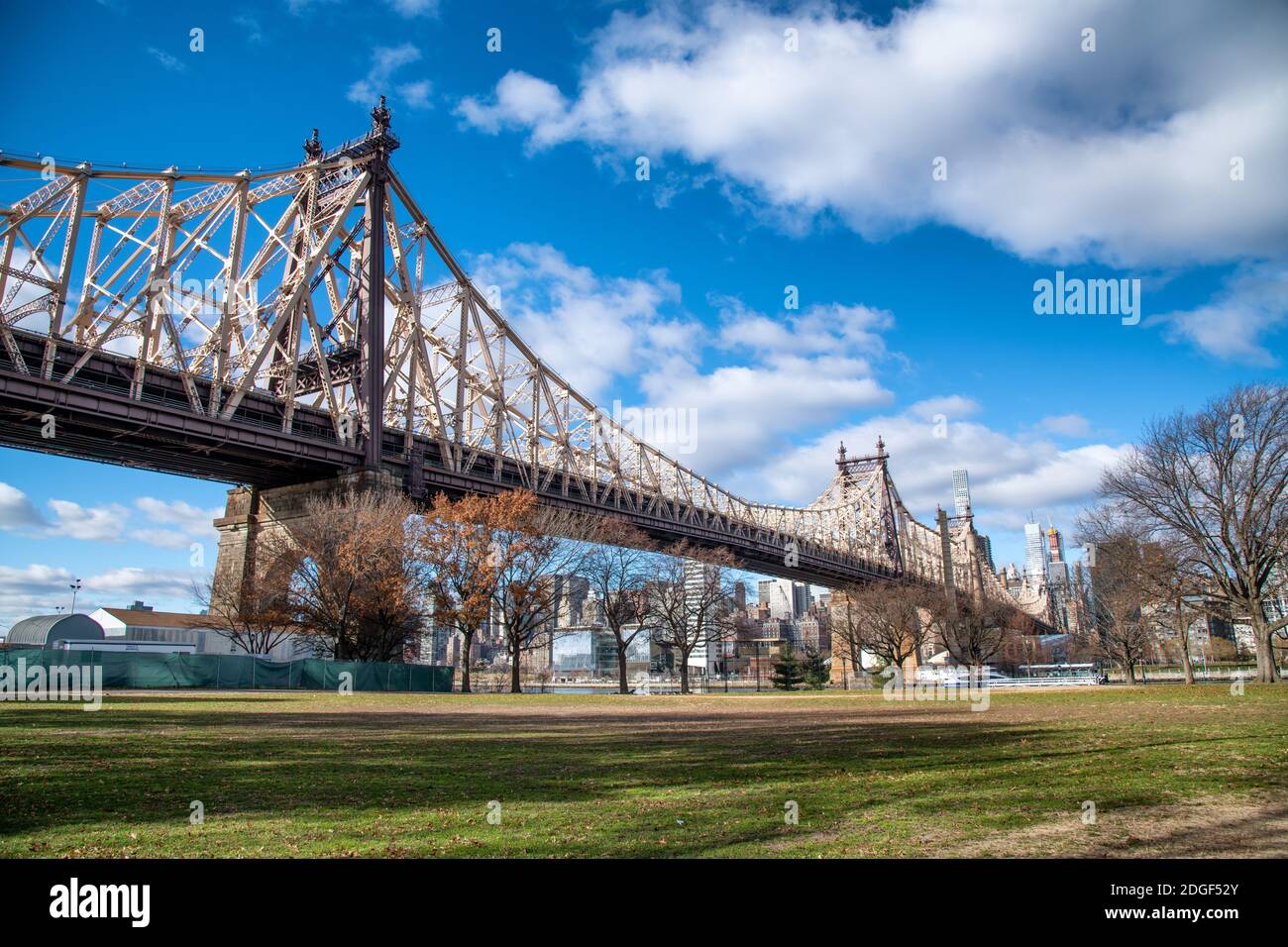 New York City Manhattan buildings from Queensbridge Park and Queensboro Bridge on a beutiful winter day Stock Photo