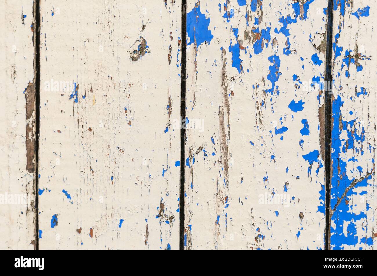 Rustic wood background, texture with weathered layers of paint. Stock Photo