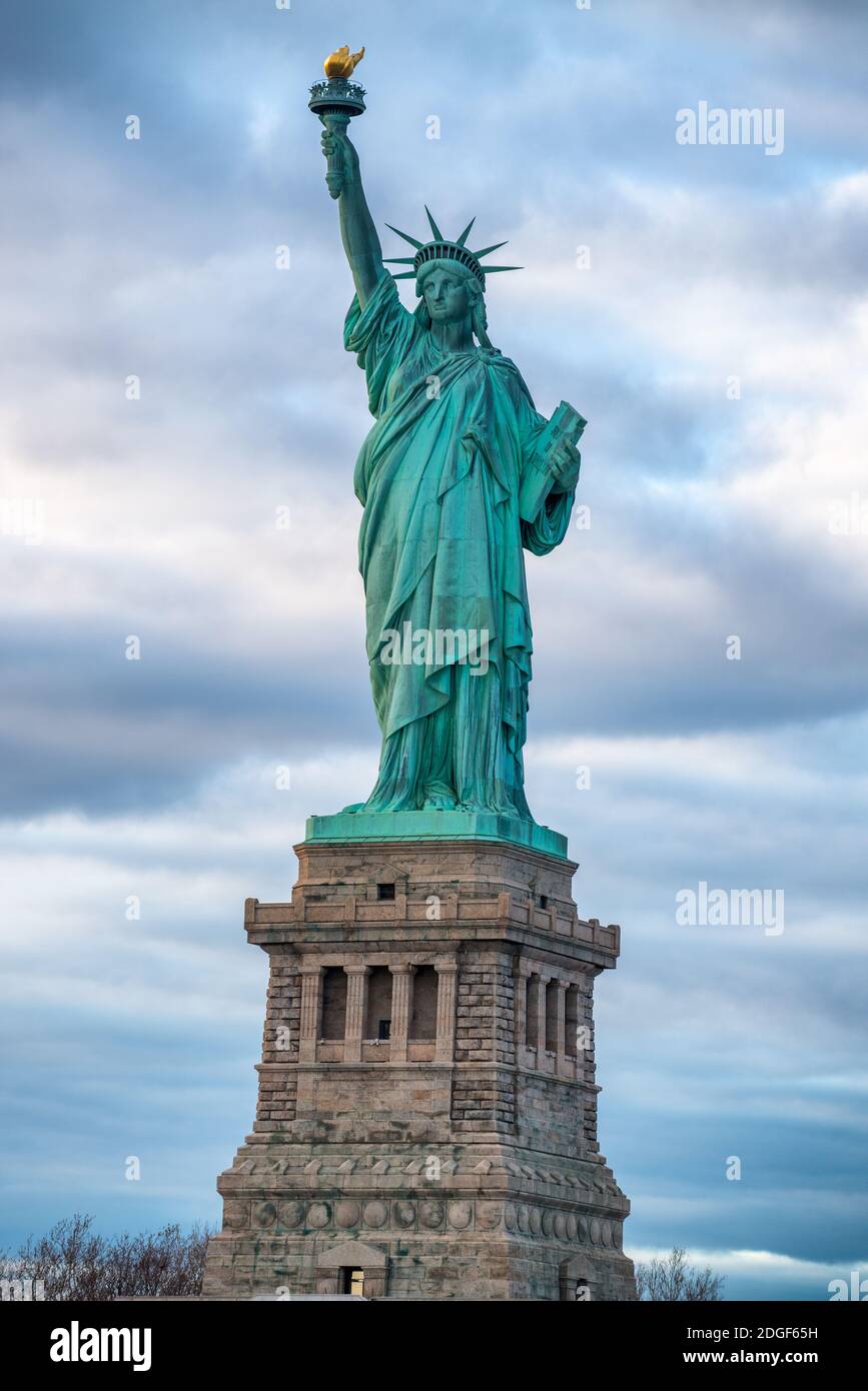 Statue of Liberty at sunset, New York City Stock Photo