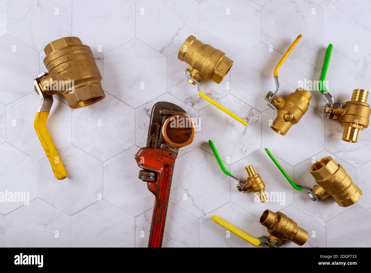 Installation plumbing parts monkey wrench construction brass plumbing fittings gate valve Stock Photo