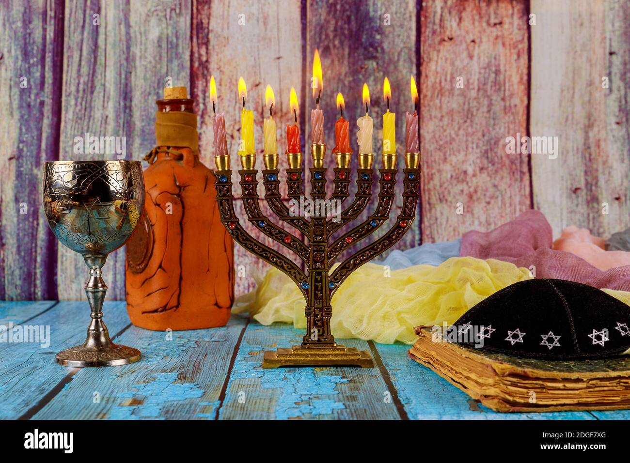 Hanukkah menorah with burning candles Stock Photo