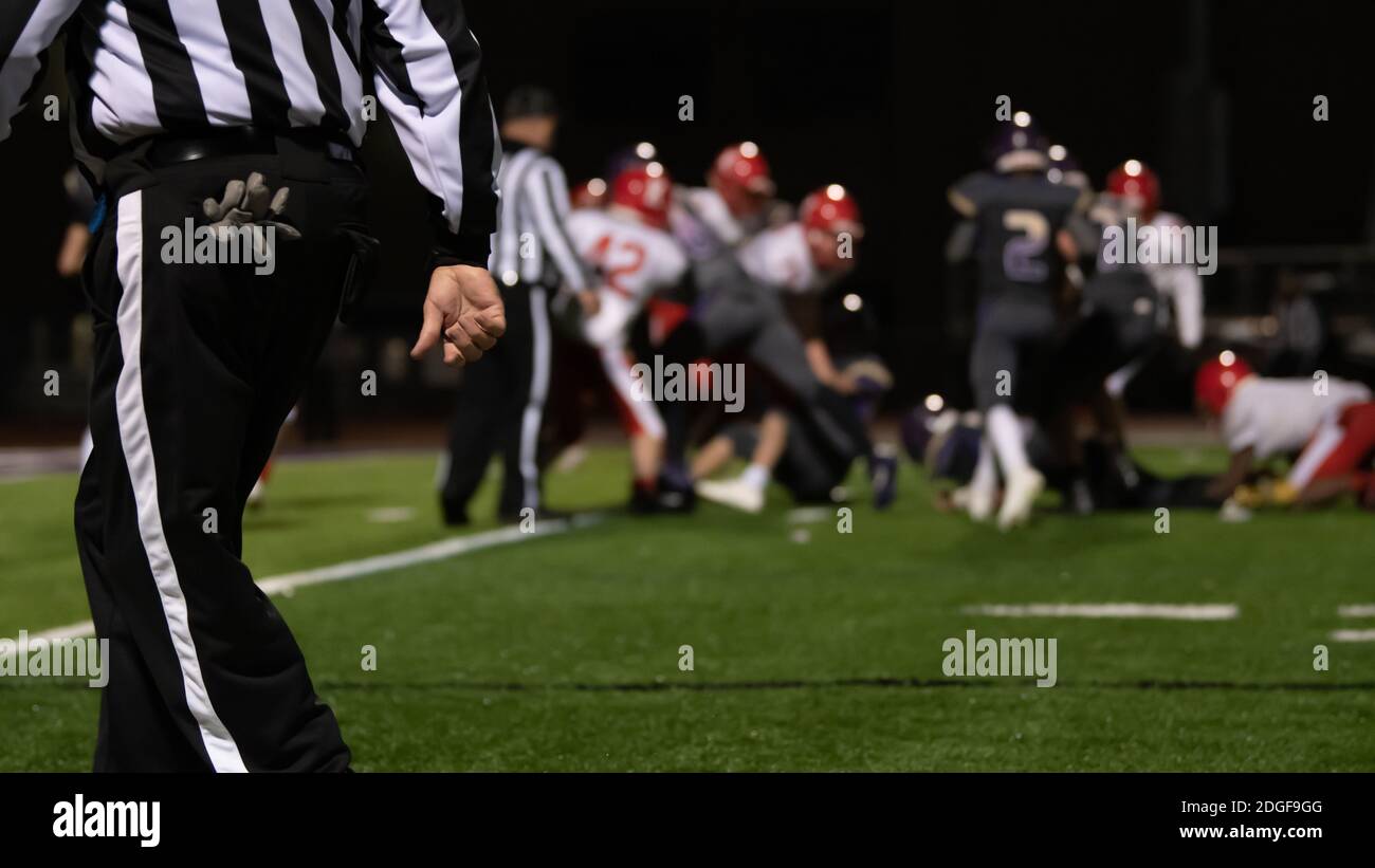 High school football umpire during a football match Stock Photo