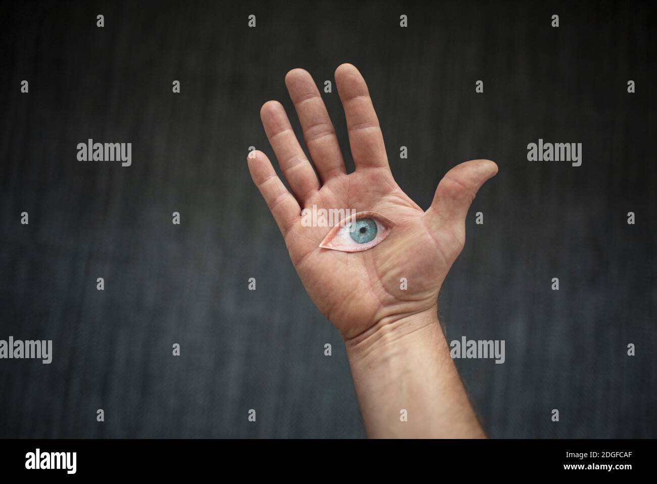 Eye on hand Stock Photo Alamy