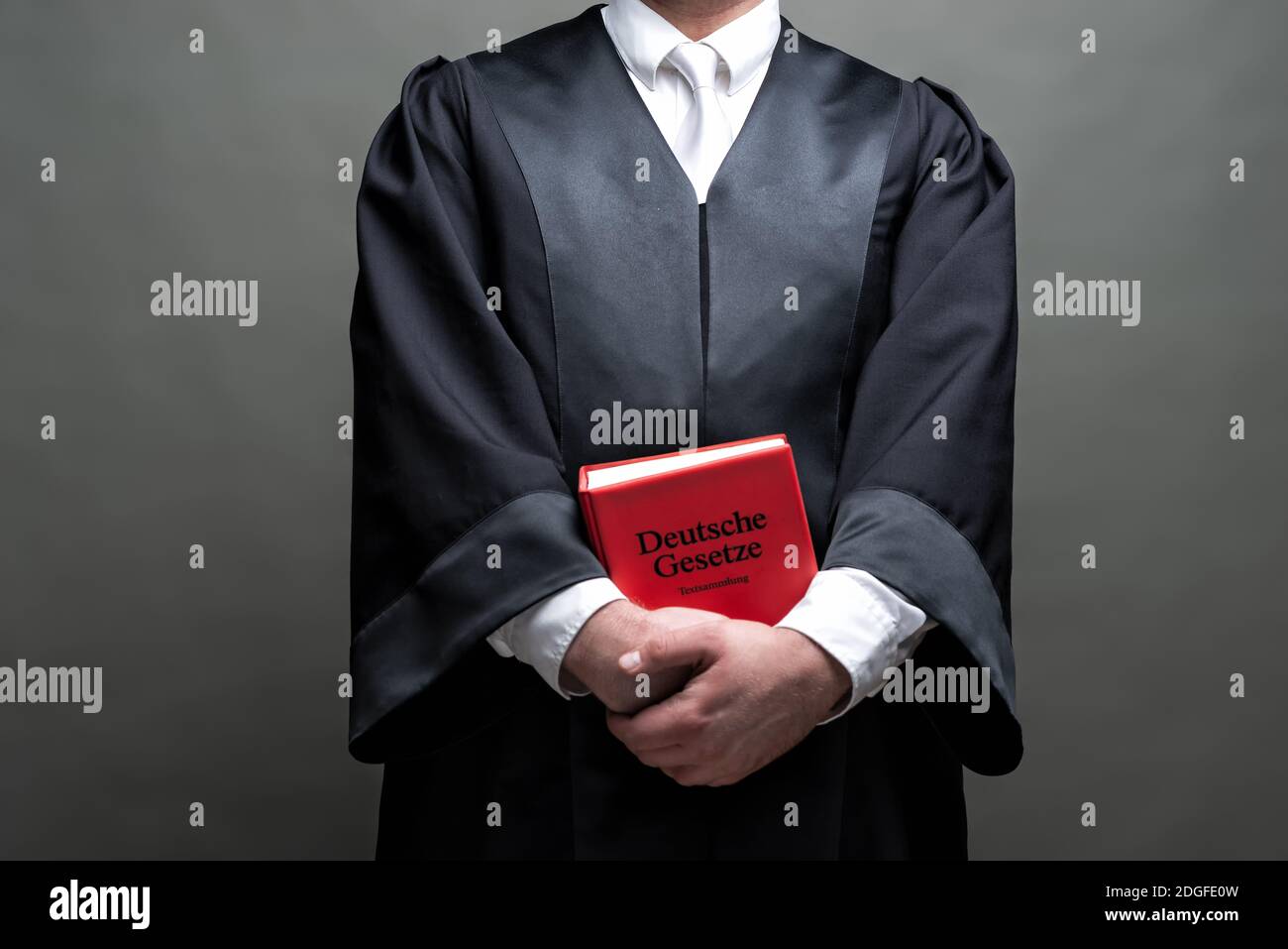 German lawyer with a robe and a book Stock Photo