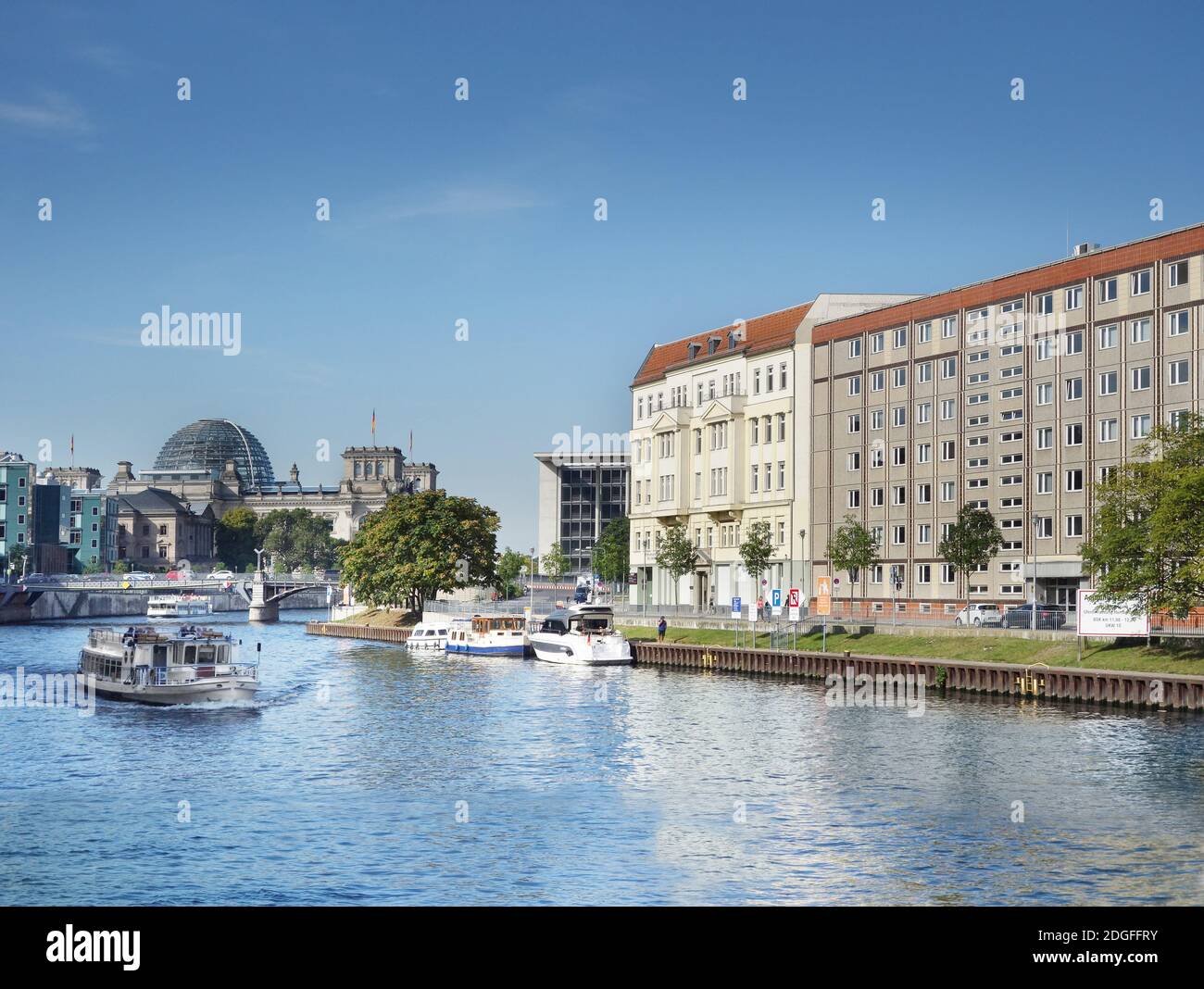 The Spree River in Berlin with Reichstag in the distance Stock Photo