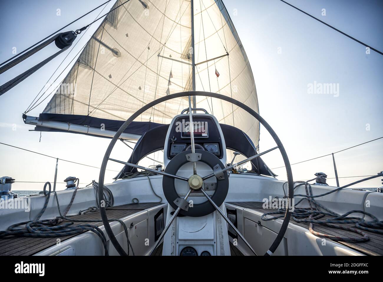 Steering wheel on a sailing yacht Stock Photo