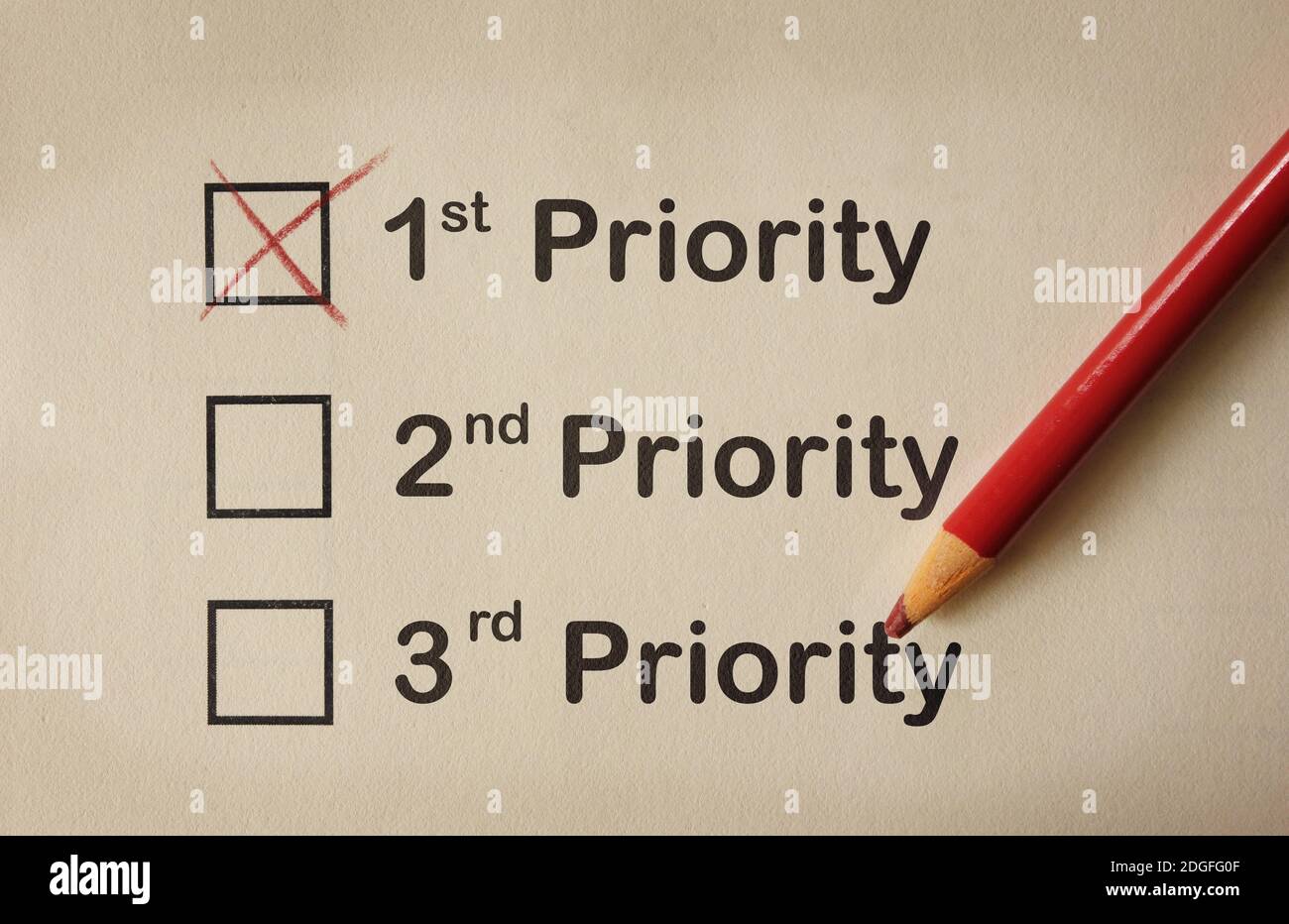 First priority marked on paper Stock Photo