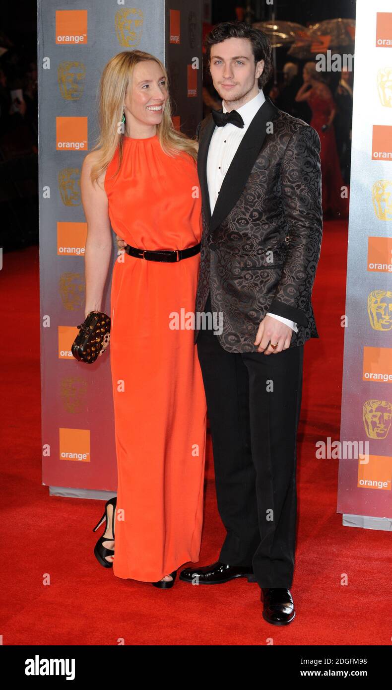 Sam Taylor-Wood and Aaron Taylor-Johnson arriving at the 2011 Orange British Academy Film Awards at The Royal Opera House, Covent Garden, London. Stock Photo