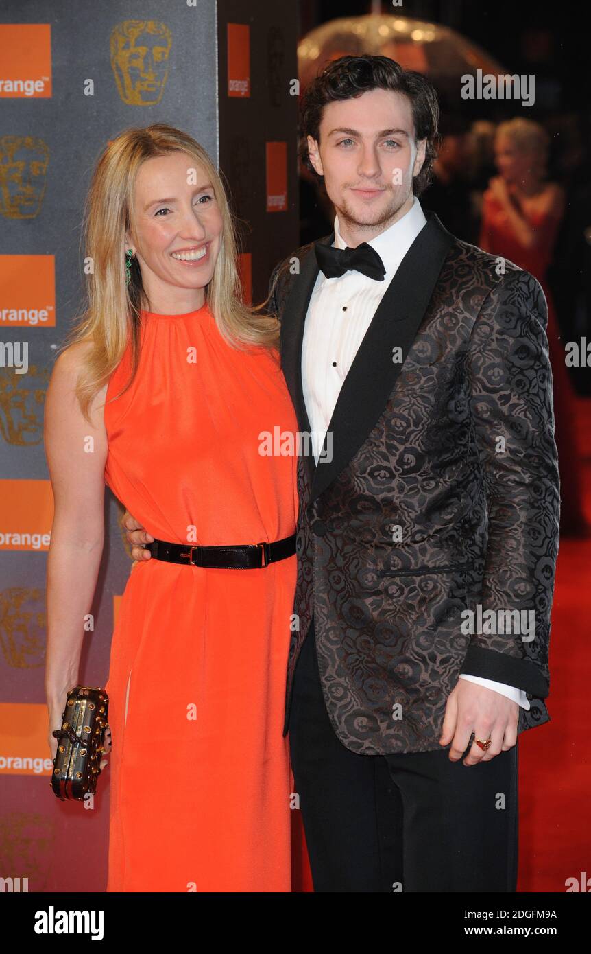 Sam Taylor-Wood and Aaron Taylor-Johnson arriving at the 2011 Orange British Academy Film Awards at The Royal Opera House, Covent Garden, London. Stock Photo