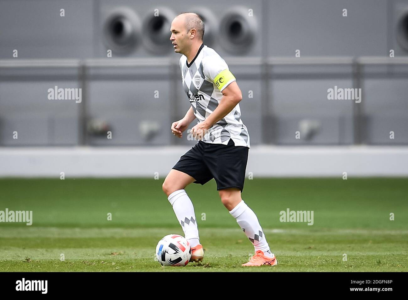 Spanish professional footballer Andres Iniesta of Vissel Kobe keeps the ball during the group match of 20/21 AFC Champions League (ACL) against Guangz Stock Photo