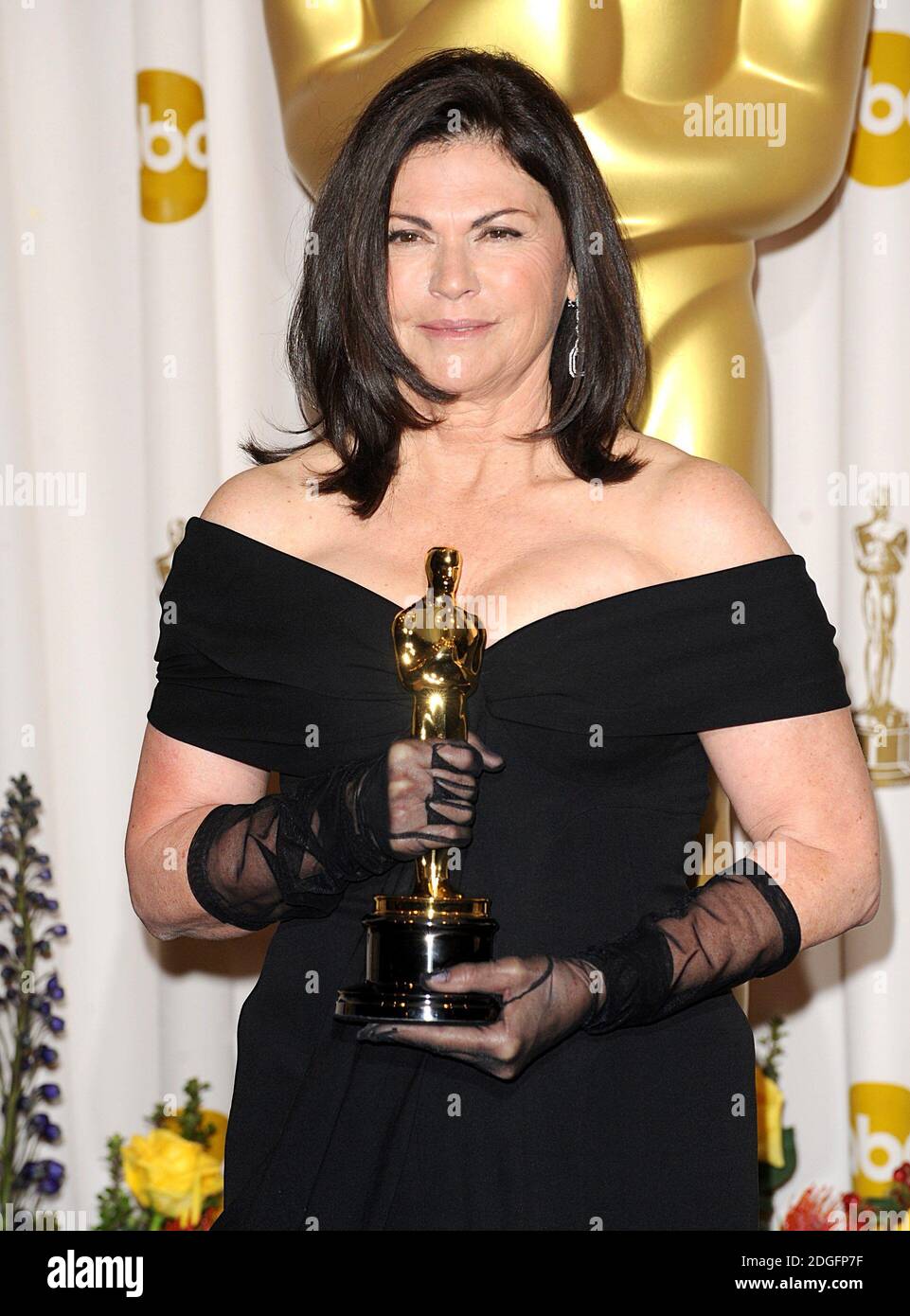 Coleen Atwood with the Best Costume Design award, received for Alice In