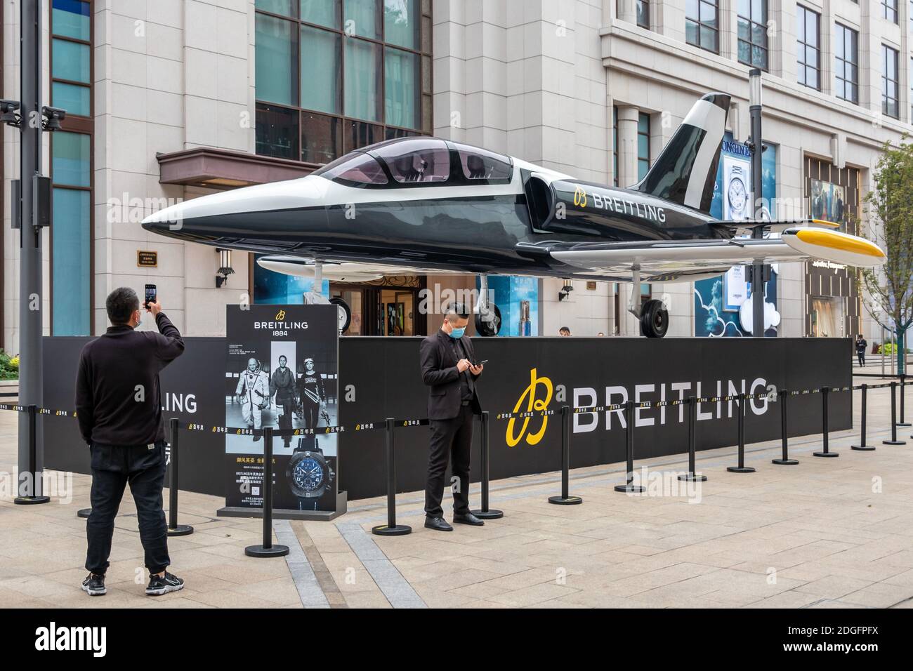 A L-39 Albatros, a high-performance jet trainer developed by Aero Vodochody is exhibited outside a mall during a promotional event of Breitling SA, a Stock Photo