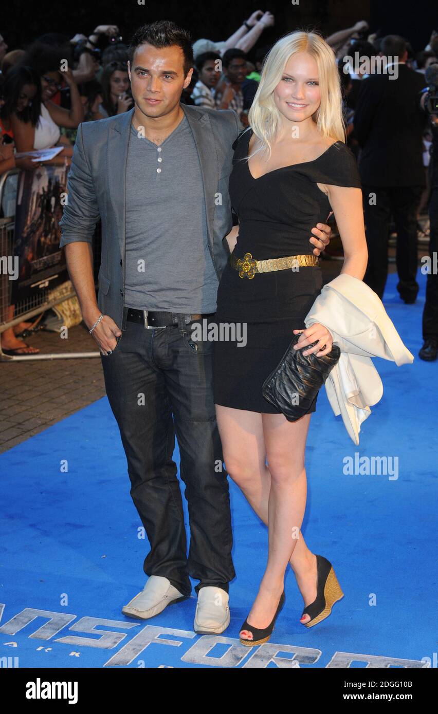 Ben Adams and girlfriend arriving at the Transformers 3 Dark Side of