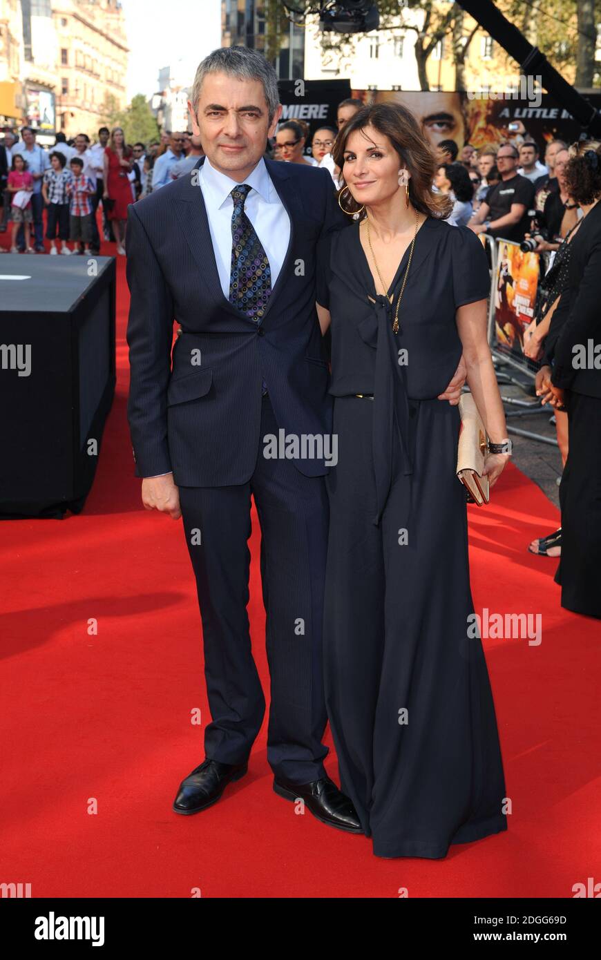 Rowan Atkinson and Sunetra Sastry arriving at the World Premiere of