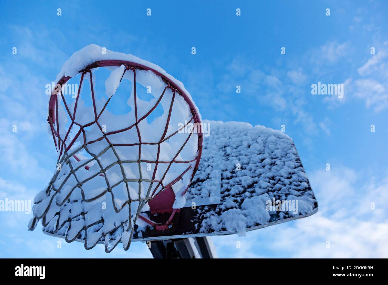 basketball hoop on which it snowed Stock Photo