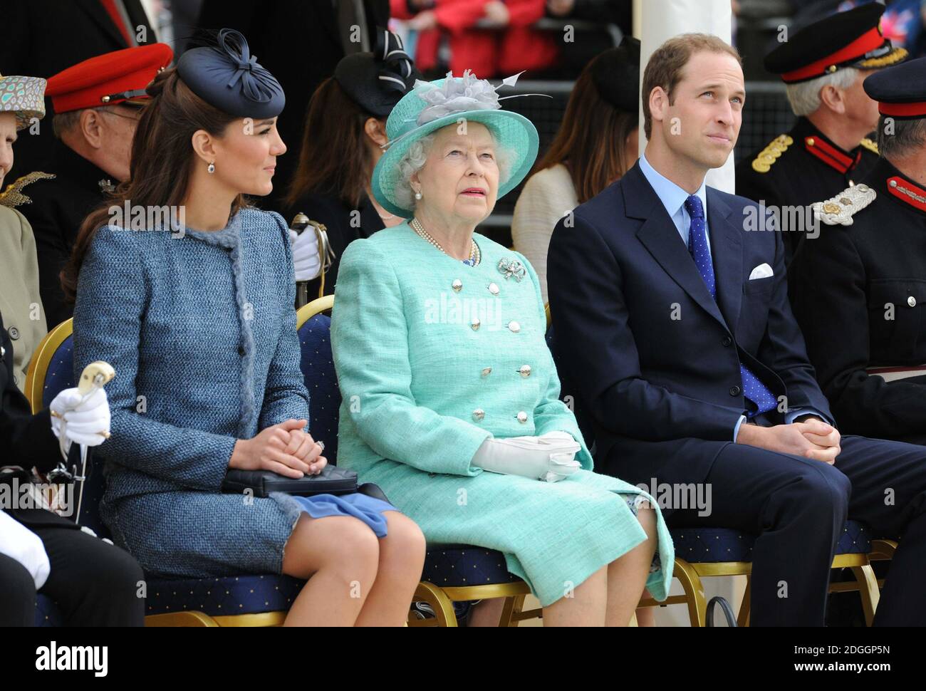 The Duchess of Cambridge, Queen Elizabeth II and Prince William, The Duke of Cambridge watch a children's sports event during a visit to Vernon Park in Nottingham. Stock Photo