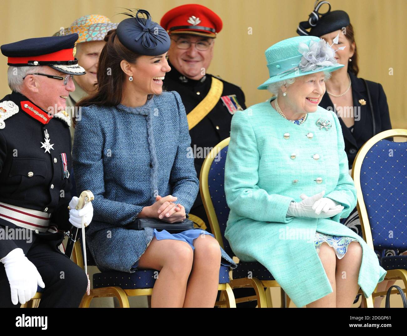 The Duchess of Cambridge and Queen Elizabeth II watch a children's sports event during a visit to Vernon Park in Nottingham. Stock Photo