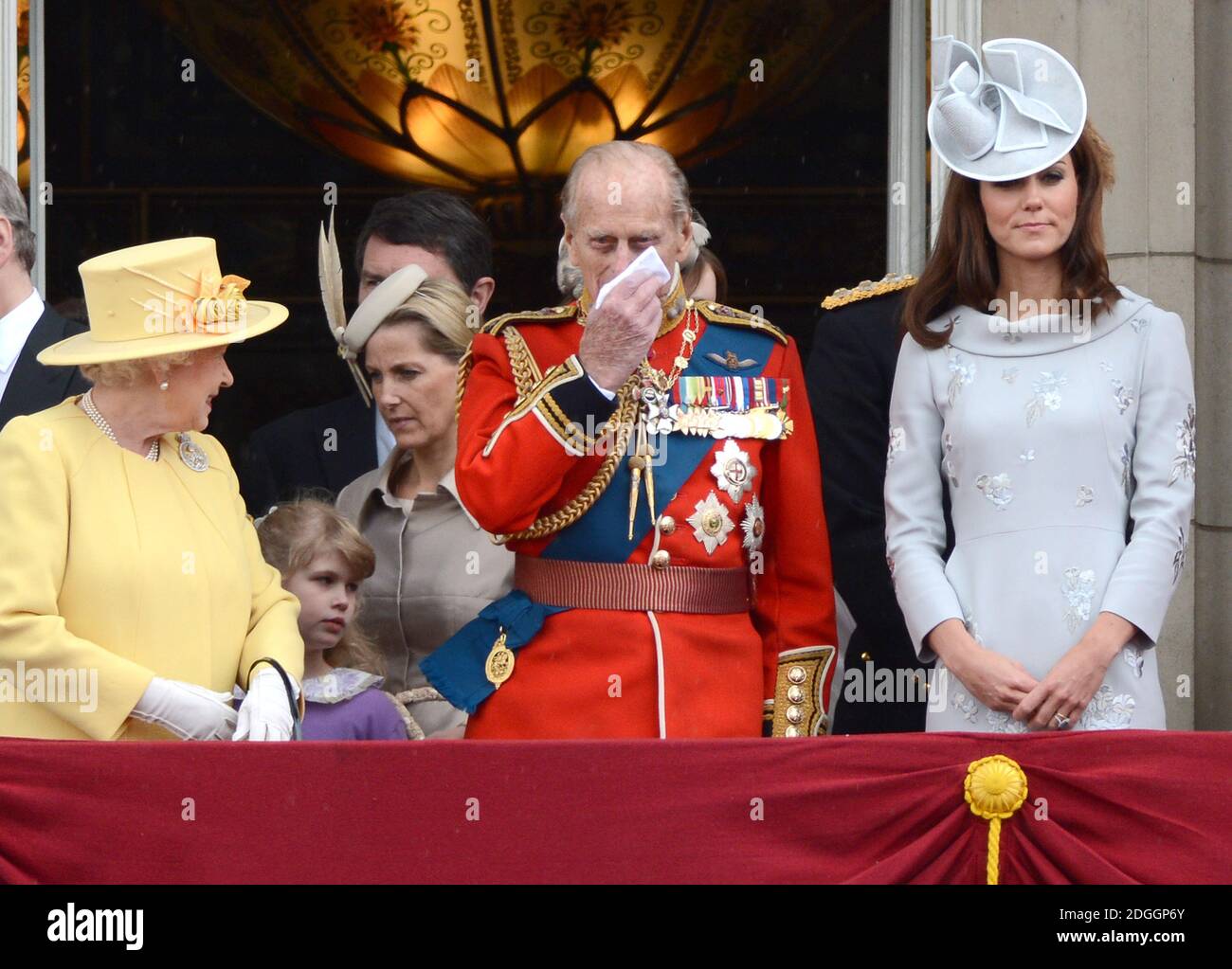 (Left to Right) Queen Elizabeth, Sophie Countess of Wessex, Prince Philip Duke of Edinburgh, Lady Louise Windsor, Catherine Duchess of Cambridge watching a Royal Air Force fly pass with their family from the balcony of Buckingham Palace after the Trooping The Colour at the Horse Guards Parade in London Stock Photo