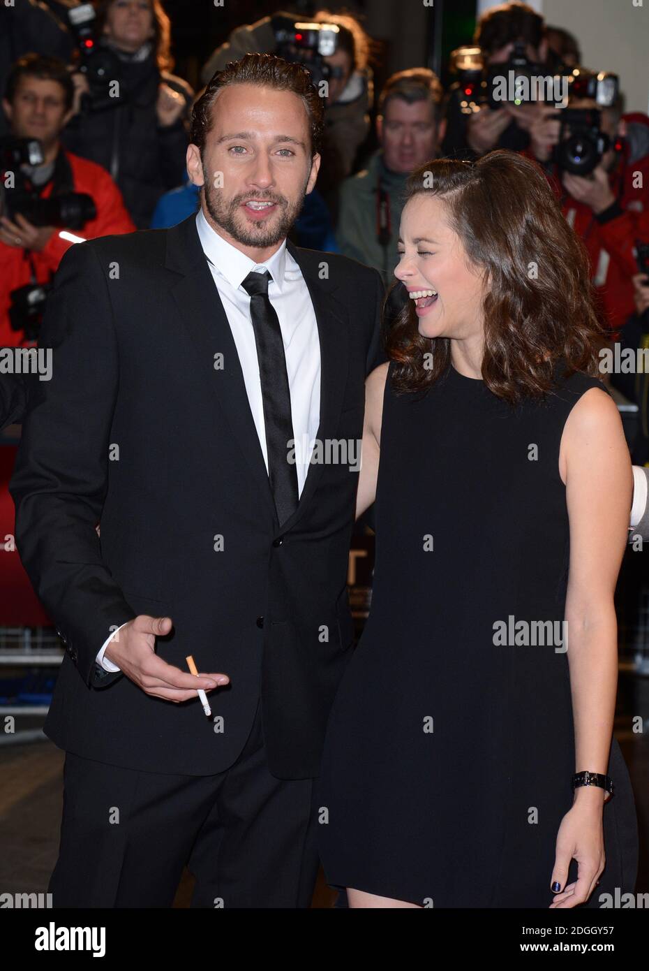 matthias-schoenaerts-and-marion-cotillard-arriving-at-the-rust-and-bone