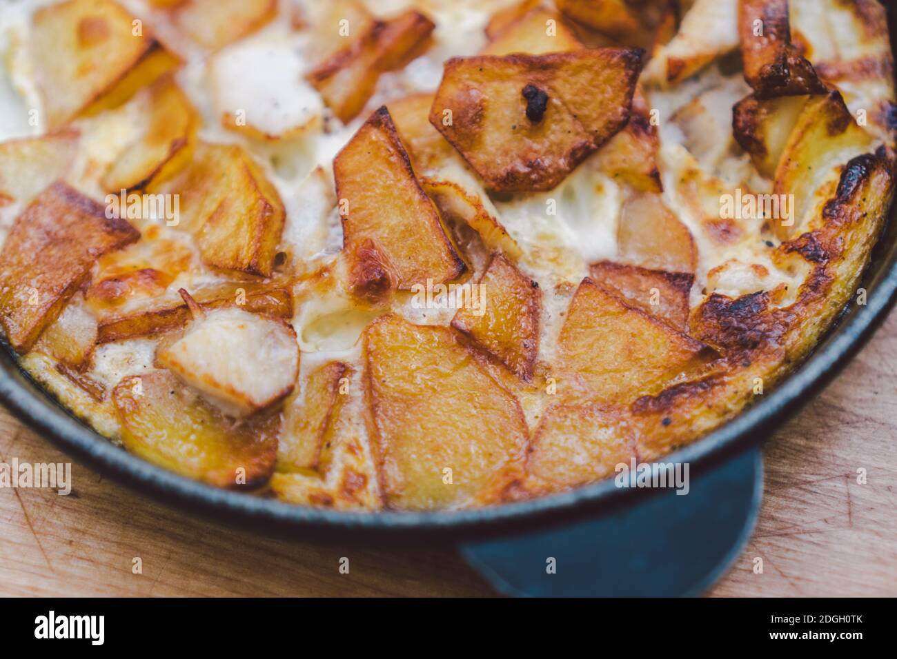 Potatoes baked with meat in the oven. Delicious dinner recipe. Potato pudding. Baked potato. Beef casserole. Potato gratin.Baked Stock Photo