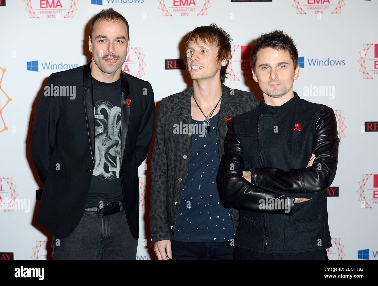 Christopher Wolstenholme, Dominic Howard and Matthew Bellamy of Muse arriving for the 2012 MTV Europe Music Awards at the Festhalle Frankfurt, Germany. Stock Photo